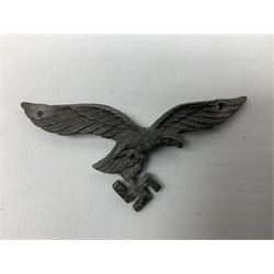 Five WW2 German peaked cap badges, four with double-pinned backs