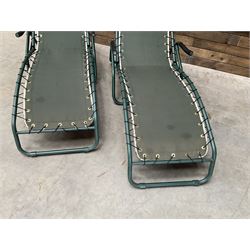 Pair metal framed folding sun loungers