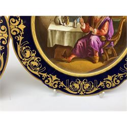 Set of six Sevres style cabinet plates, each with printed and heightened genre scene to centre, within a gros bleu border with gilt detail, each with spurious Sevres marks beneath, D24cm