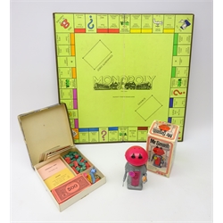  Mr Smash clockwork Walking Smash Martian, boxed toy and vintage Monopoly board game  