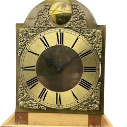 A bespoke handmade 20th century longcase clock in a slim Yew wood case with a German three train weight driven movement sounding the hours and quarters on 12 gong rods, with a brass break-arch dial, cast brass spandrels and an etched chapter ring, Roman numerals and minute track, dial engraved 'Parkinson Liner',  convex boss to the arch engraved 'Tempus Fugit', strike silent facility, With triple weights & Pendulum. 


