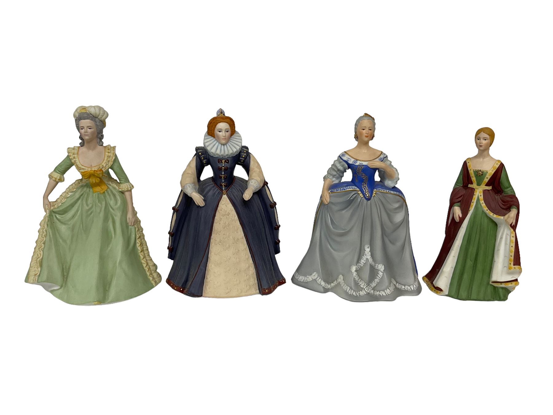 Four limited edition Franklin Mint figures of queens comprising Elizabeth I, Isabella of Spain, Catherine the Great and Marie Antoinette