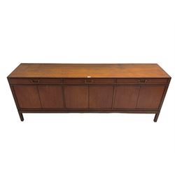 Mid-20th century teak sideboard, fitted with three drawers and three double cupboards