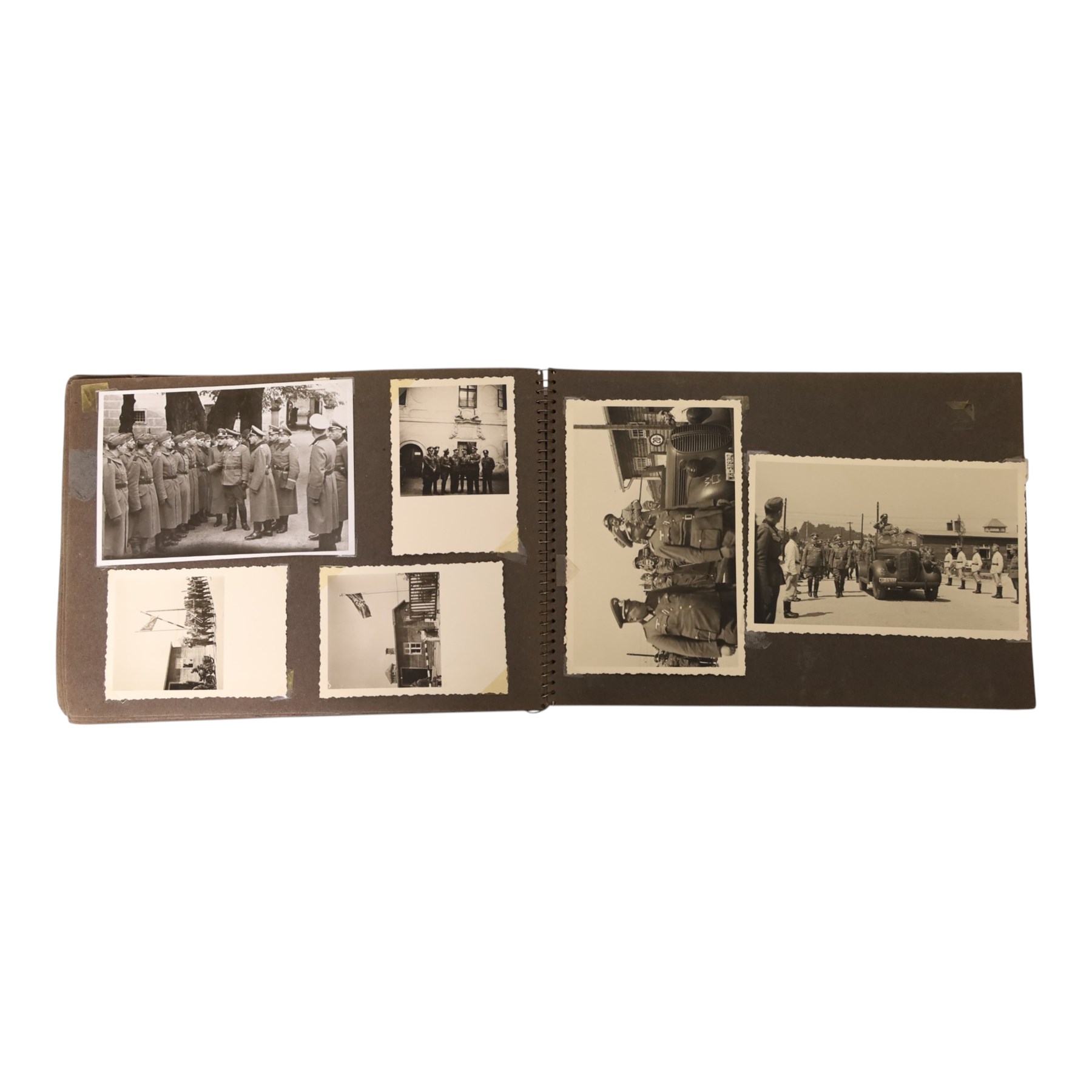 WWII German Soldiers photo album, 1942, including photographs of soldiers in uniform posing during parade etc  