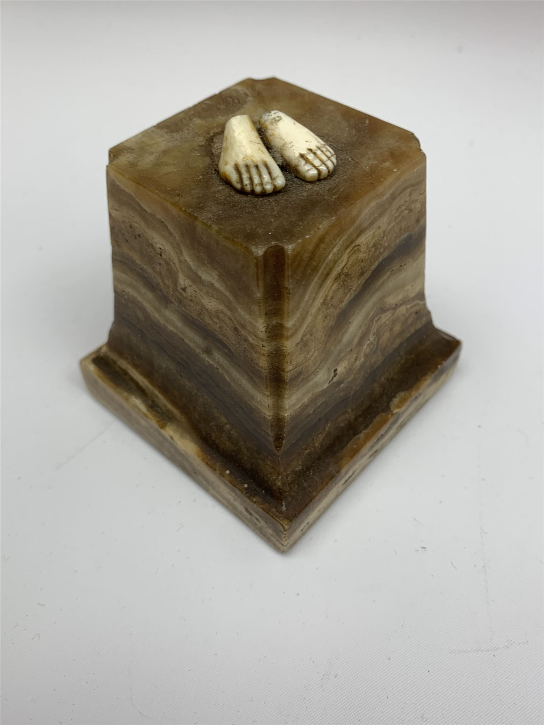 Demetre Chiparus (1886-1947): Innocence, a gilt bronze and ivory figure, circa 1925, standing in contemplative post with hands clasped, upon onyx plinth, signed to base, H24.4cm