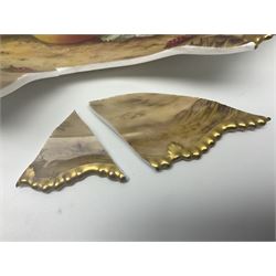 Early 20th century Royal Worcester dish decorated by Thomas Lockyer, oval form with gilt shaped rim and twin shell handles, hand painted with a still life of fruit upon a mossy ground, signed T Lockyer, with puce printed mark beneath and date code for 1922, for restoration, W31cm