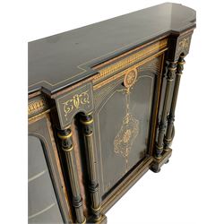 Victorian ebonised and inlaid credenza, break-front with curved ends, the front fitted with two curved glazed doors and central panelled door, inlaid with scrolling foliate and star motifs, quadruple turned and fluted pilasters to front, gilt egg and dart moulded edge on plinth base with figured walnut band, on turned feet