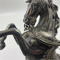 Modern silver model of a rearing horse, with ornate parcel gilt saddle and bridle, mounted upon a rectangular base, decorated with malachite panels to each side and upon four gilt bun feet, horse stamped 925, overall H14.5cm