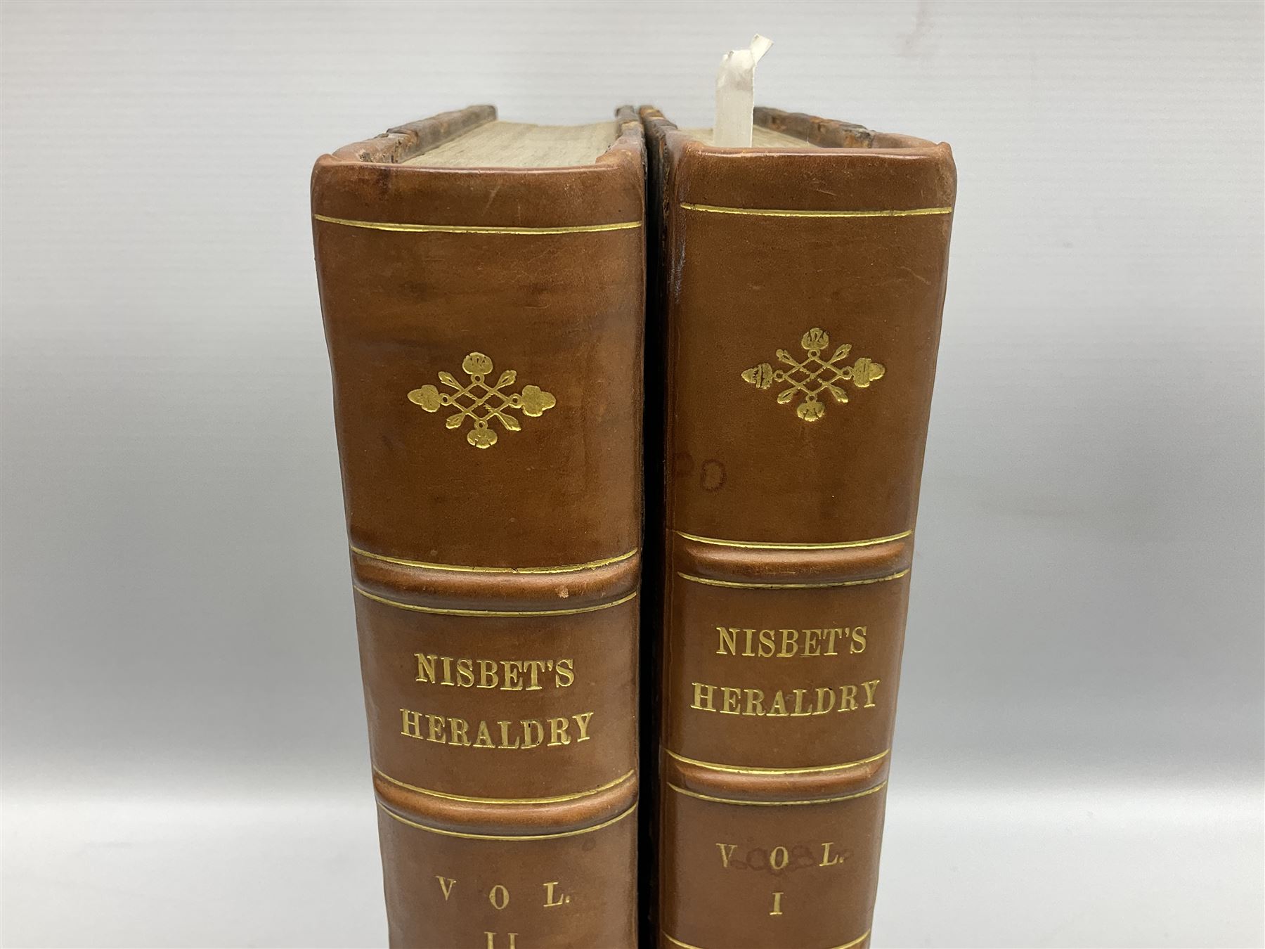 Nisbet Alexander: A System of Heraldry Speculative and Practical with the True Art of Blazon According to the Most approved Heralds in Europe[...], R. Fleming, Edinburgh, 1722, 1742, 2 vols, engraved plates, full calf binding re-backed using original boards 
