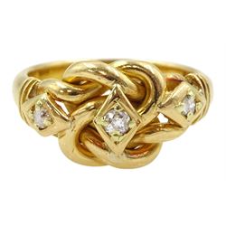 Edwardian 18ct gold three stone old cut diamond love knot ring, maker's mark EK, London 1903