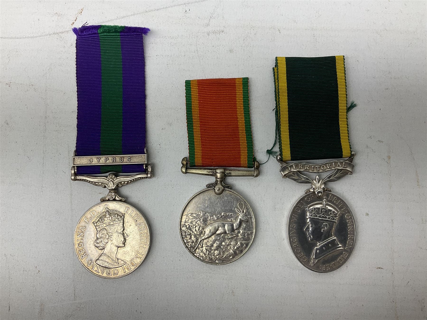 QEII General Service Medal awarded to 23504634 CFN. R.G. Beech REME; Pakistan Independence Medal awarded to Nadir Khan F.C.330; India Independence 50th anniversary medal; and a quantity of WW2 and later medals including Territorial Efficiency Medal awarded to 6196646 Gnr. J.G. Oatway R.A. (13)