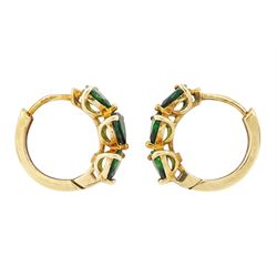 Gold tsavorite garnet ring and a pair of gold tsavorite garnet hoop earrings, both hallmarked 9ct
