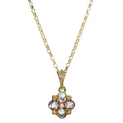 Gold oval aquamarine and diamond flower cluster pendant necklace, hallmarked 9ct