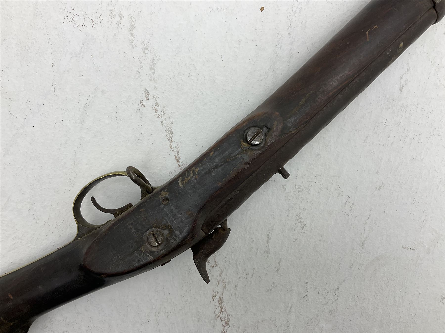 20th century Indian percussion musket, the 76cm barrel with two bands, indistinctly inscribed lock-plate, walnut full stock stamped 642 with brass butt and trigger guard and under barrel ramrod channel L121cm overall