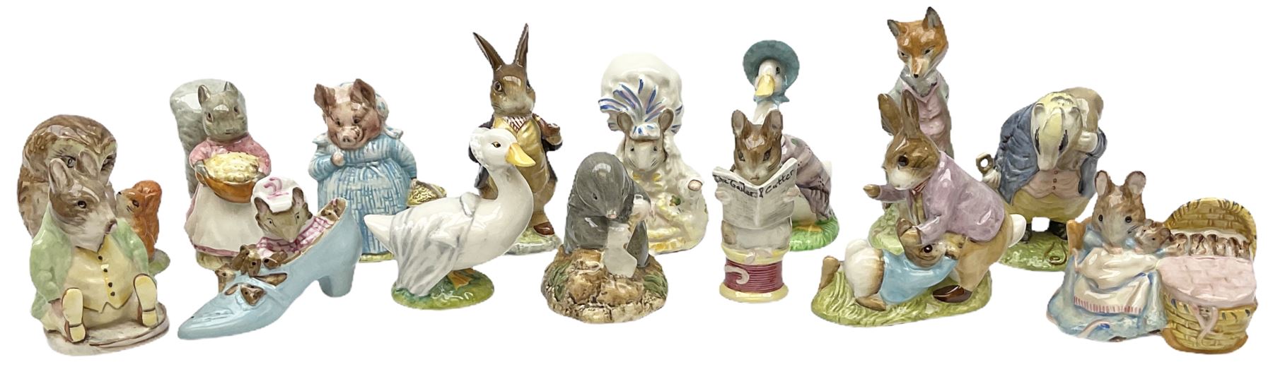 Fifteen Beswick Beatrix Potter figures, comprising Tommy Brock, The Old Woman who live in a Shoe, Samuel Whiskers, Foxy Whiskered Gentleman, Old Mr Brown, Mr Benjamin Bunny and Peter Rabbit, Tailor of Gloucester, Goody Tiptoes, Mr Benjamin Bunny, Diggory Diggory Delvet, Jemima Puddleduck, Aunt Pettitoes, Hunca Munca, Rebeccah Puddle-Duck, and Lady Mouse. 