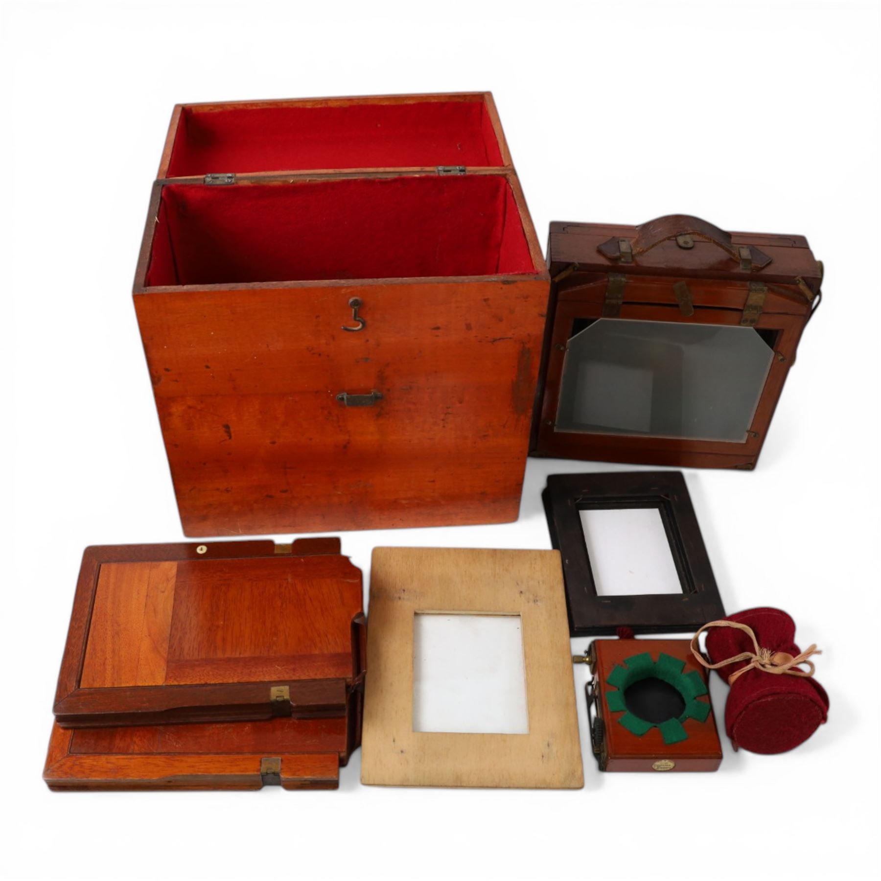 IVORY Early 20th century Taylor's Drug Co. The Albion half plate camera, with brass lens two plates numbered 2 and 4,and accessories, in leather carry case