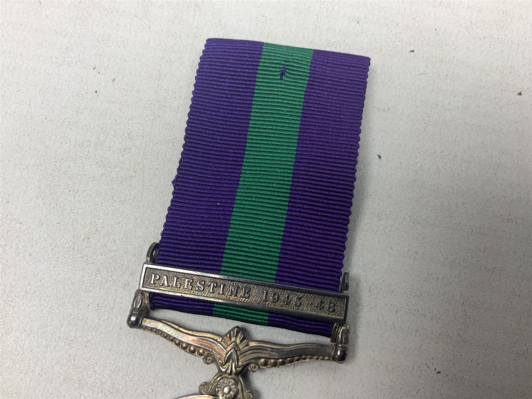 George VI General Service Medal with Palestine 1945-48 clasp awarded to 19117460 Pte. P. Tilmouth R. Lincolns; with ribbon