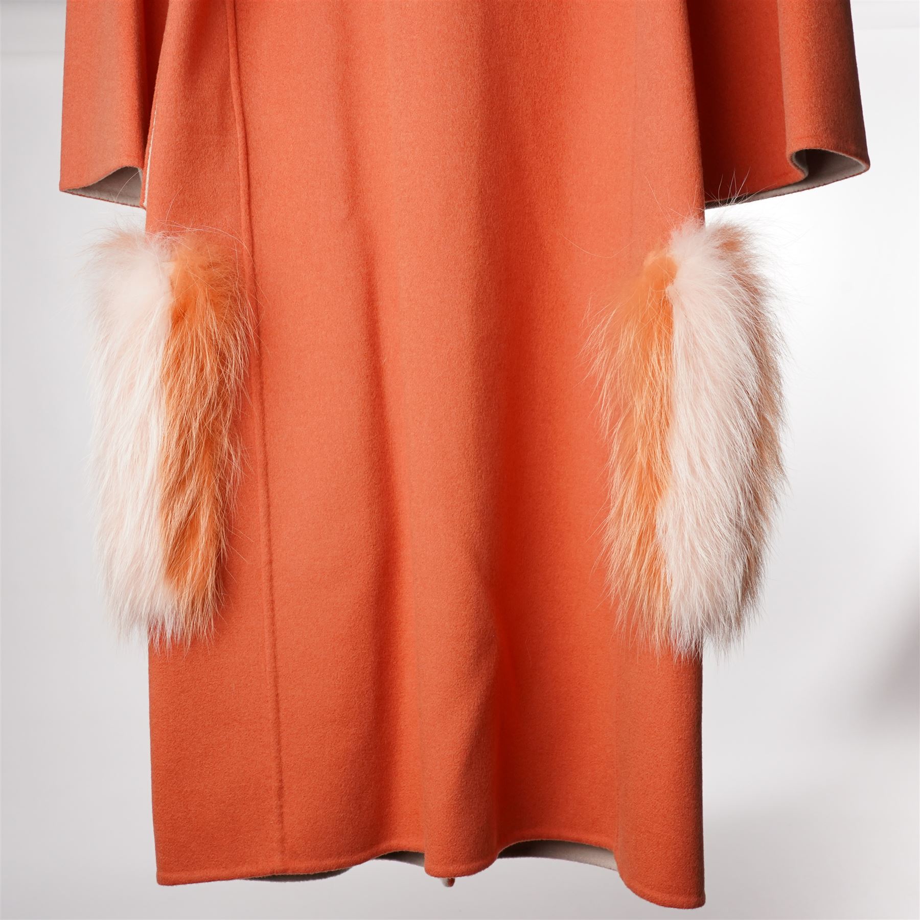 Fendi Roma - wool cape coat in 'Cayenne' orange peach, with concealed front fastening and short flared cape sleeves, applied with dyed arctic fox fur patch pockets, size 40, unused with original tags