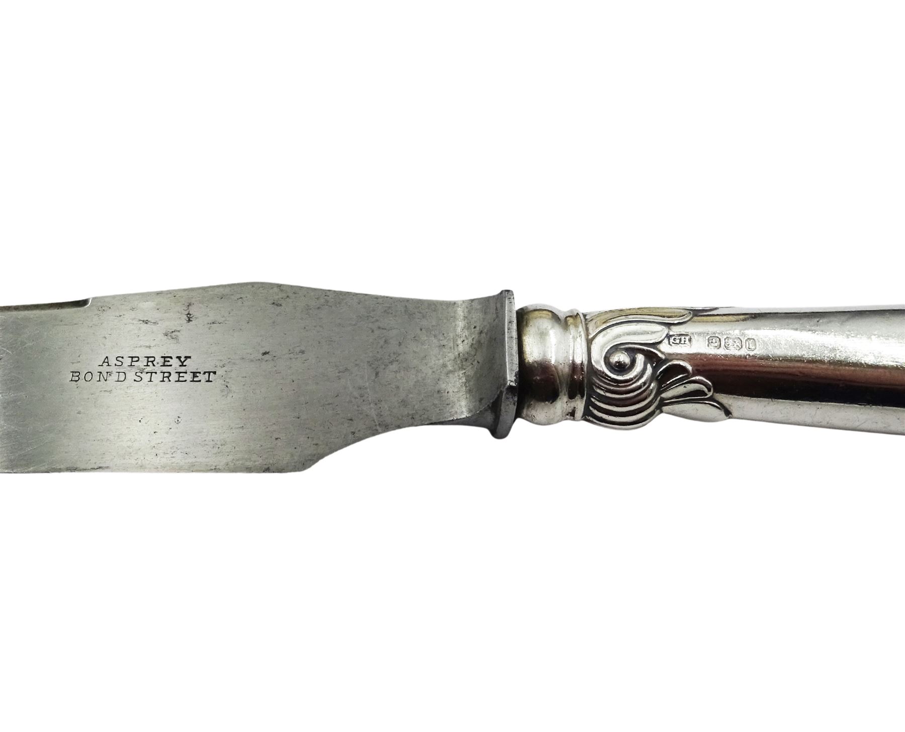 Edwardian silver handled three piece carving set, the knife blade stamped Asprey Bond Street, hallmarked Harrison Brothers & Howson, Sheffield 1903, contained within a fitted case, the interior silk lining marked Asprey 166 Bond St London 