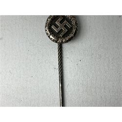 Nine WW2 German lapel pins including five Infantry Assault, Tank Assault etc 