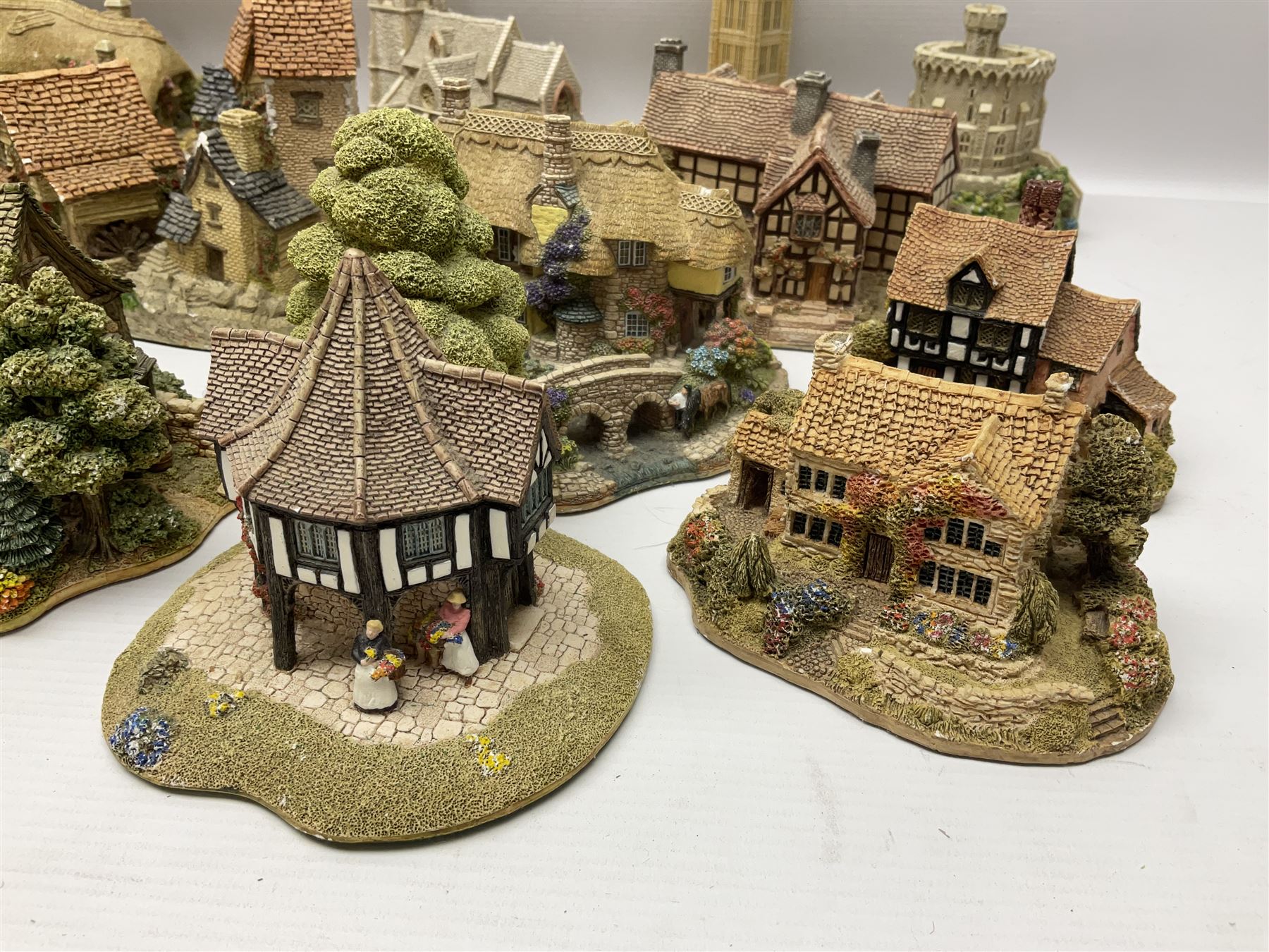Twenty six Lilliput Lane models, to include Golden Harvest, Junk and Disorderley, Heaven Lea Cottage, Old Scrumpy Farm, Chantry Chapel Wakefield, etc, together with four similar cottages