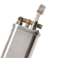 Dunhill - tallboy table lighter, silver-plate with reeded decoration and engine-turned body, on octagonal stepped base H10cm 