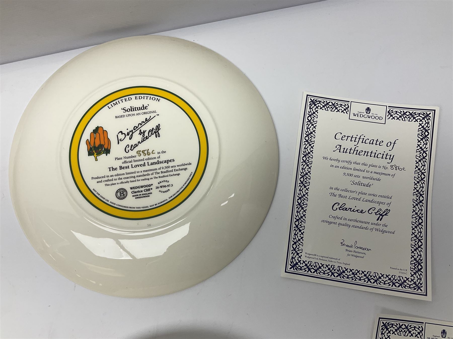 Four Clarice Cliff Wedgwood limited edition plates, comprising Orange Erin, Blue Firs, Solitude and May Avenue, all with certificate and box, D26cm