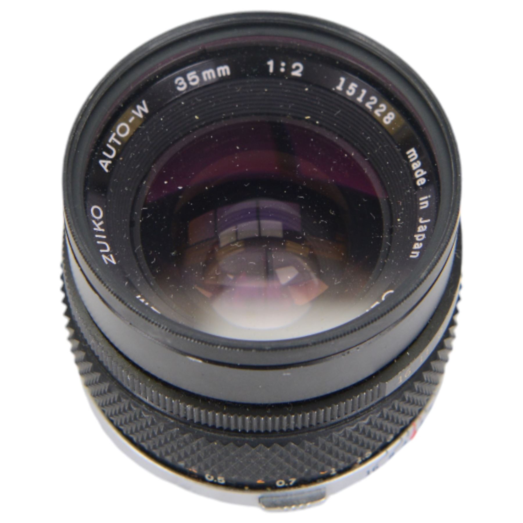 Olympus OM-4 T camera body serial no. 1126911, with two Olympus OM-System Zuiko MC Auto-S lenses, one 1:1.54 f=50mm, the other 1:1.8 f=50mm, an Auto-W 35mm 1:2 lens, Olympus OM winder 2, flash and other accessories, in a Tamrac carry case 