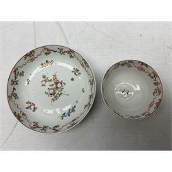 Two 18th century Newhall tea bowls and saucers, the first example decorated with pattern no 195, hand painted painted with floral sprays, the second hand painted with flowers in a gilt boarder, together with a similar tea bowl