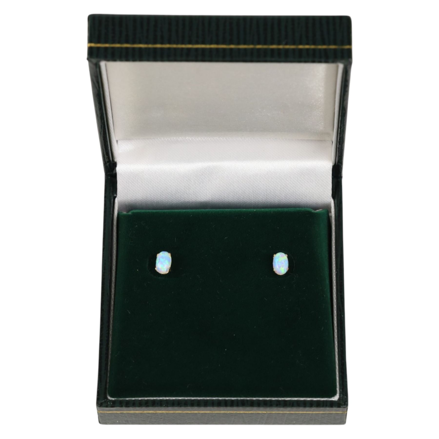 Pair of 9ct gold opal earrings, boxed