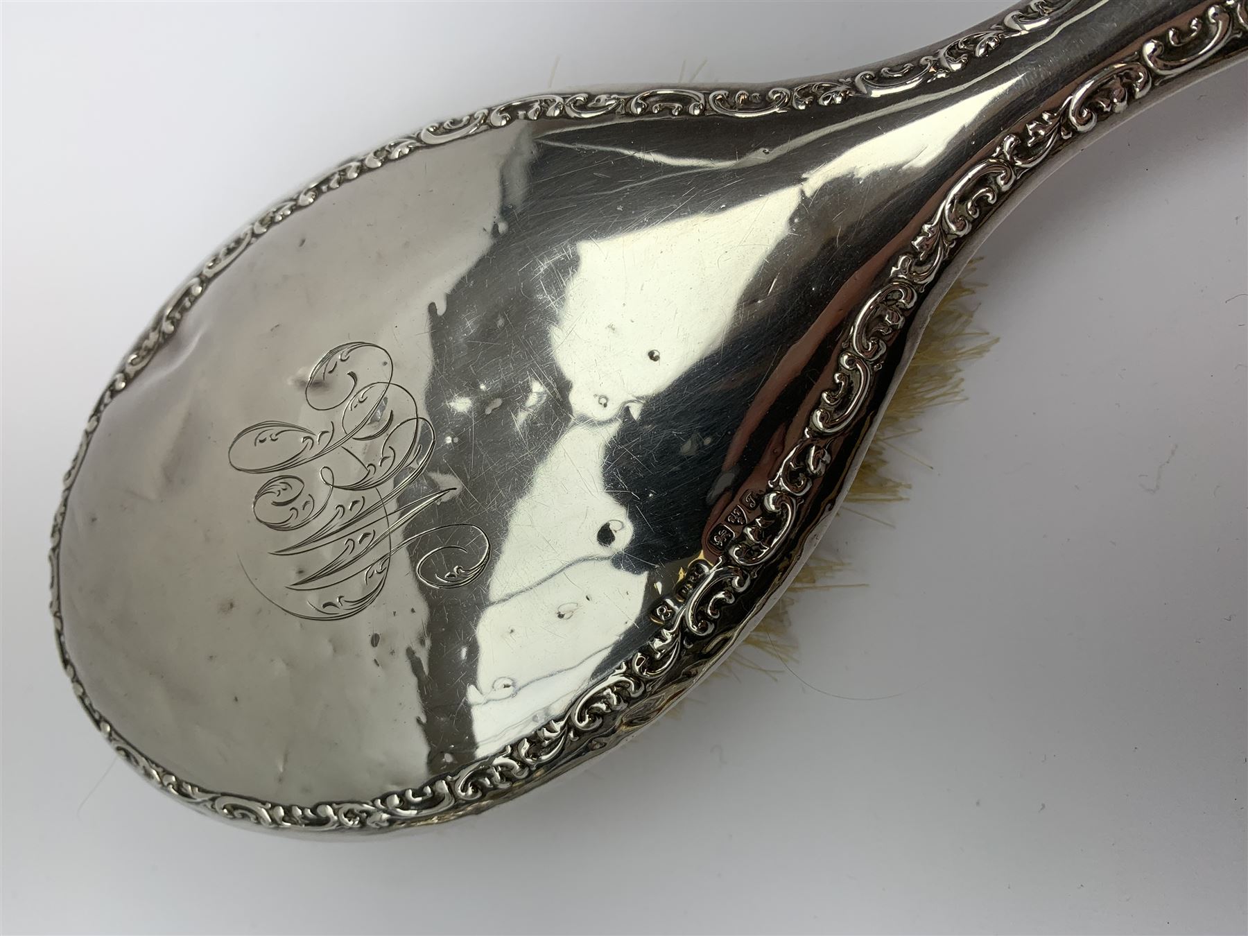 Two silver napkin rings by Collingwood & Sons Ltd, Birmingham 1928 and two other silver napkin rings hallmarked, approx 3.2oz, cased set of silver silver handled knives, hallmarked Sheffield 1915, together with a selection of silver plated flatware, to include Walker and Hall fish eaters set, cased nut cracker set with grape scissors, etc., plus a silver mounted hair brush and hand held mirror, hallmarked Chester 1919