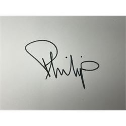 HM Queen Elizabeth II and HRH the Duke of Edinburgh - signed 1997 Christmas card with two gilt cyphers to front and colour photographic portrait inside,  signed Elizabeth R and Philip with manuscript date 1997 below