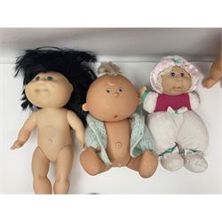 Plush covered soft toy of a swimming duck with squeeze type musical action L17cm; and collection of ten Cabbage Patch type dolls by various makers including Mattel, Hasbro, Appalachian Artworks, Migliorati etc