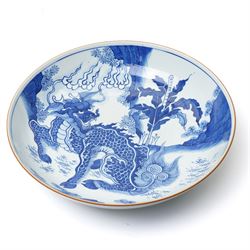 17th century Chinese blue and white charger, decorated centrally with a Qilin, four character mark within double blue ring to base, D34cm