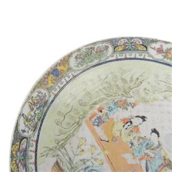 19th century Chinese Canton charger, decorated in polychrome enamels with figures to centre, bordered with panels of flowers and butterflies, D34cm