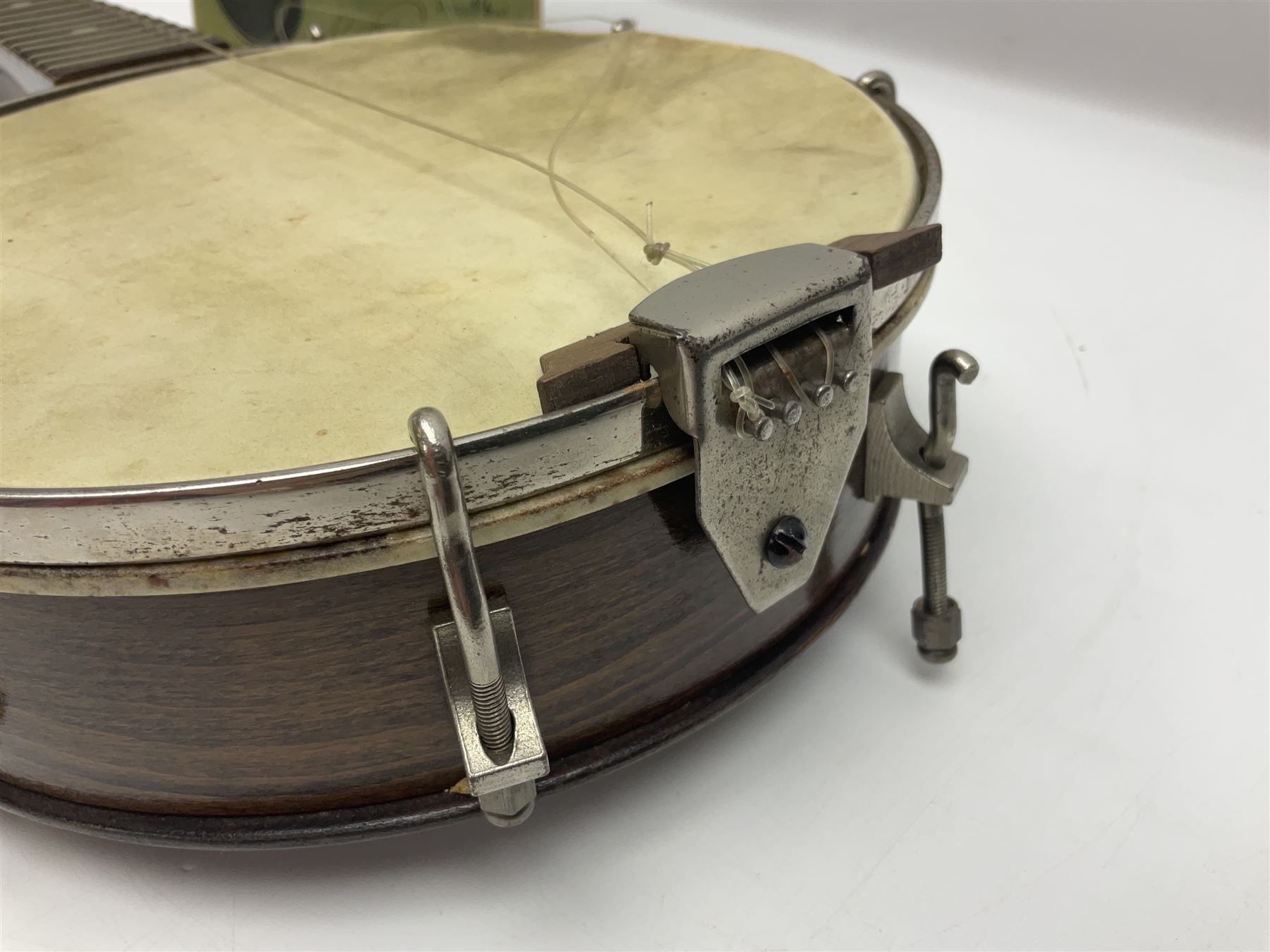 George Formby banjolele with metal plaque to headstock L55cm; in carrying case with instruction booklet.