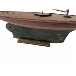 Large Victorian pond yacht, the planked hardwood hull with large lead weighted keel and working rudder, simulated planked deck and single mast with original sails; on later scratch-built wooden stand L117cm H151cm