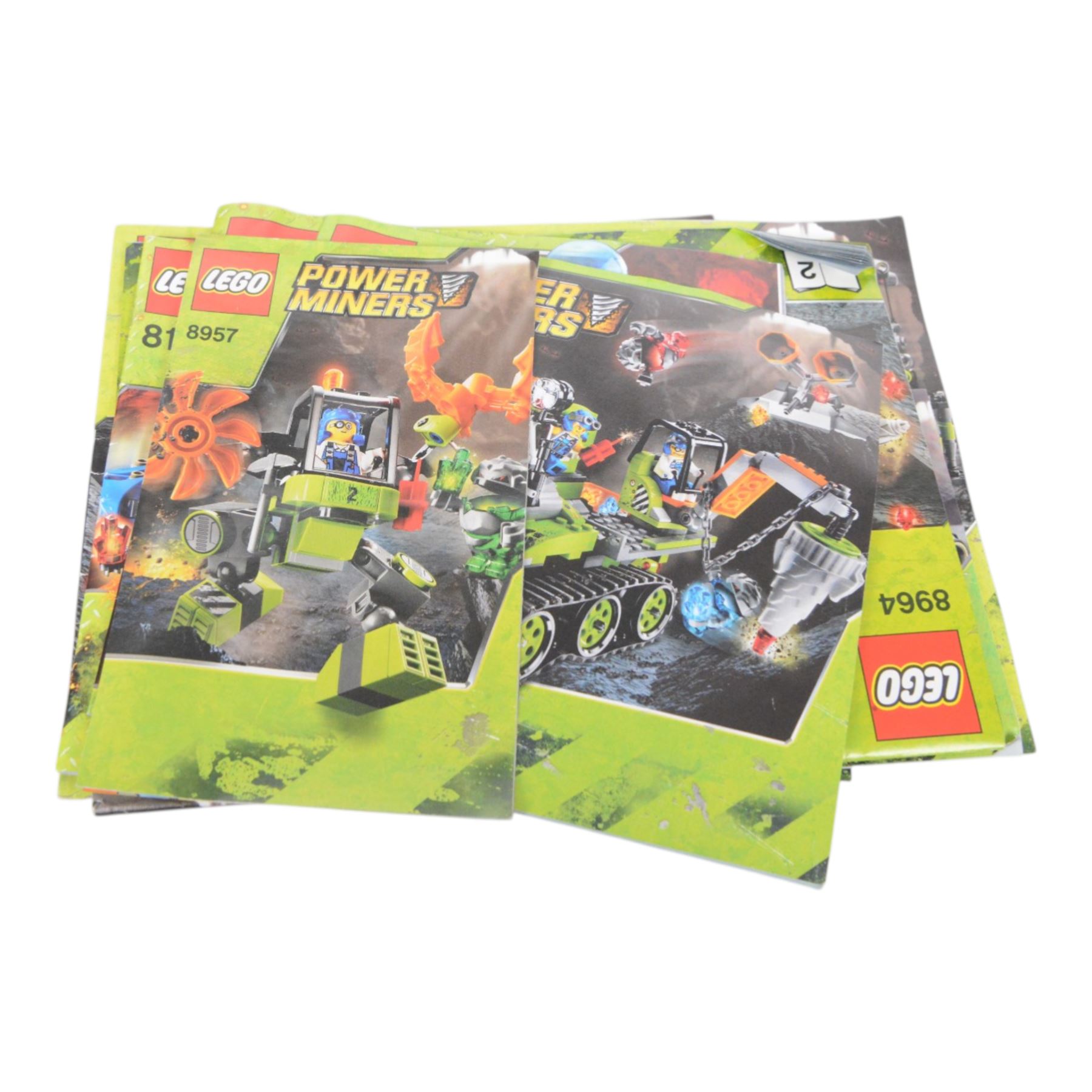 Lego Power Miners sets, including 8957, 8964, 8958, 8190, 8189, 8961 and 8963, all partially built with instructions