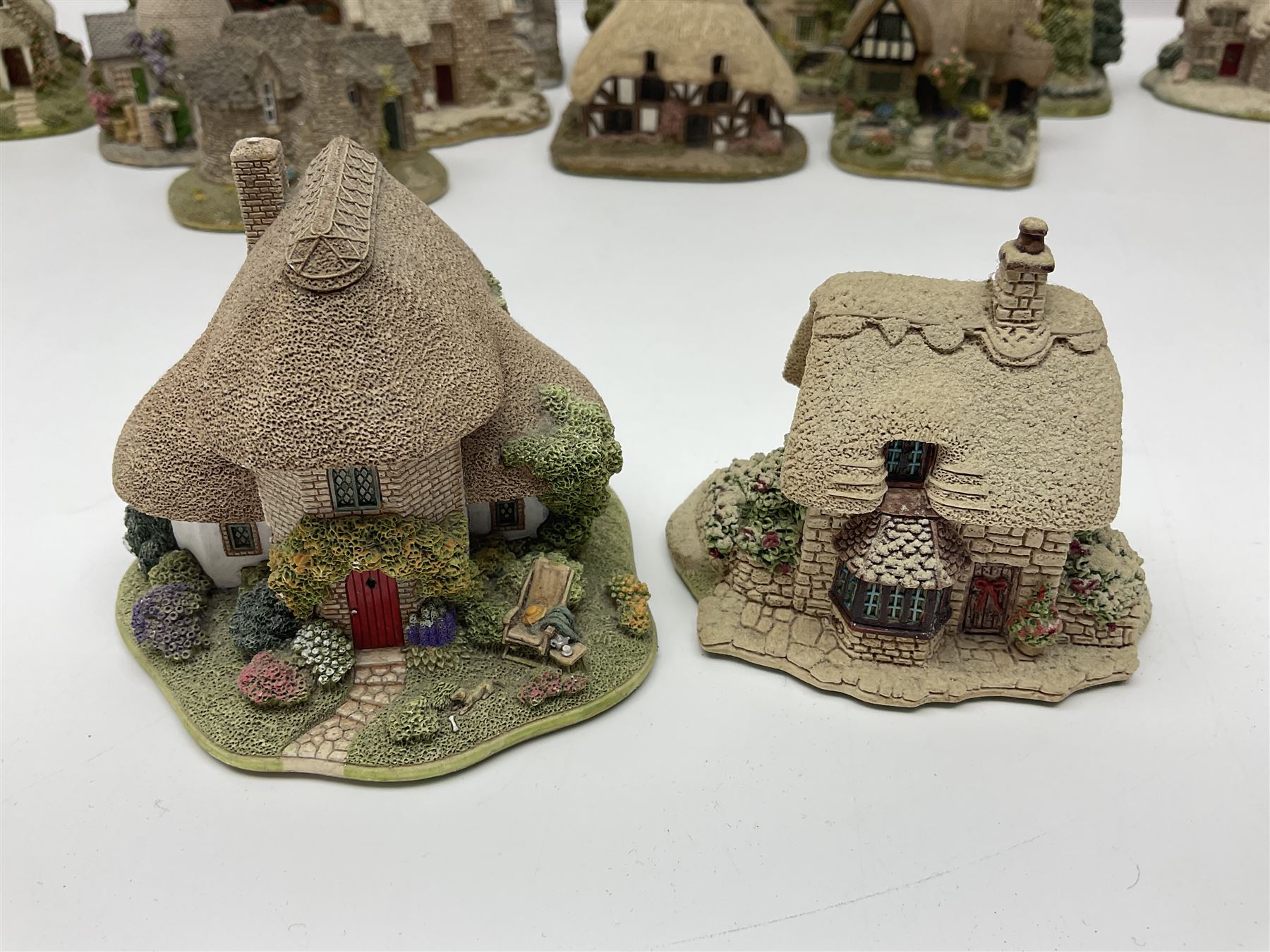 Thirty Lilliput lane, to include Hill Top, Bottle Oven, April Cottage, Thimble Cottage, Honeysuckle III, Gullivers Pantry etc
