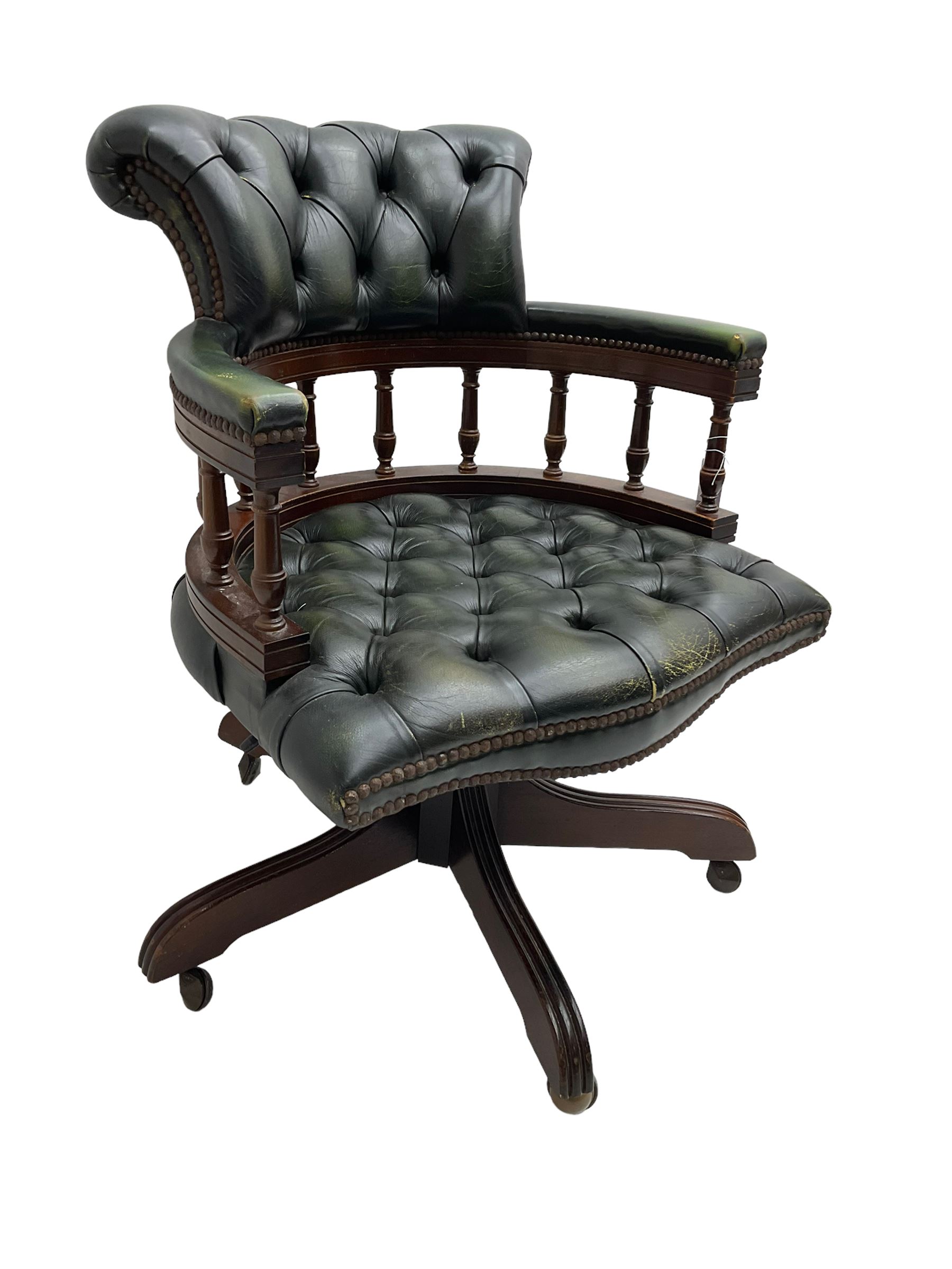 Captains swivel desk chair, upholstered in buttoned leather