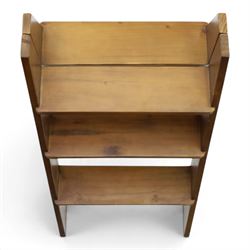 Contemporary wooden folding stepladder, three treads to each side, turquoise painted panels bearing champagne logos, with metal hinges and folding stays