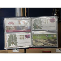 Approximately one hundred and fifteen Royal Mint coin covers, in two ring binder folders and loose, together with approximately 53 grams of Great British pre-1920 and approximately 68 grams of Great British pre-1947 silver threepence coins, and a small quantity of further pre-decimal coins