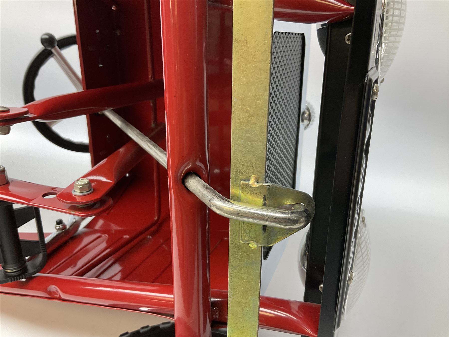 Red child's tin-plate pedal car with chrome detail, by Posh Paddles, Scarborough, H56cm, L80cm