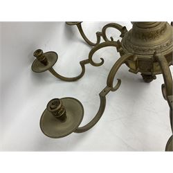 20th century heavy brass eight branch electrolier, detailed with putti masks, approximately H60cm W71cm