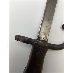 French Model 1874 epee/gras bayonet the 52cm steel piped back blade inscribed St. Etienne Avril 1877, in original scabbard, both numbered 17101, L66cm overall