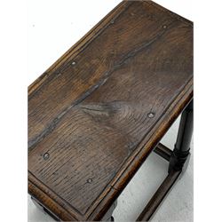 Late 17th century oak joined stool, rectangular moulded top on splayed turned supports joined by stretchers, moulded frieze panels 