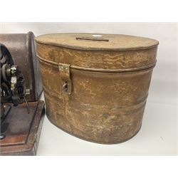 Metal hat box, together with another metal traveling case and a singer sewing machine 