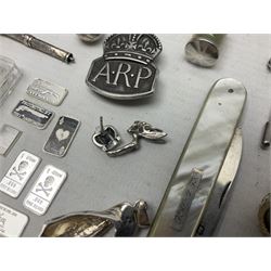 Silver mother of pearl handled fruit knife, silver jewellery including masonic pendant necklace, shell pendant, coin ring, Claddagh ring and charms etc, and a collection of ingots