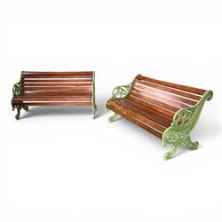 Pair of Victorian design cast iron and slatted wooden garden benches, the ornate pierced e...