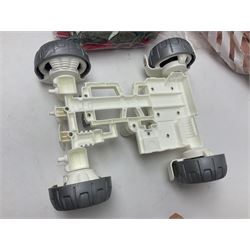 Action Man - large collection of 1960s and later figures and accessories including Spaceman with ATLRV vehicle; two figures marked 'Made in England by Palitoy under licence from Hasbro 1964'; twenty-five assorted weapons; radio backpacks; kit bags; twenty-one pairs of boots; football boots and snow shoes; metal diver's boots and three pairs of flippers; two pairs of jackboots; roller skates; various tunics, trousers, flying suits, jumpers, belts etc; twenty helmets, berets, busby, kepis, submariner etc; and quantity of other accessories